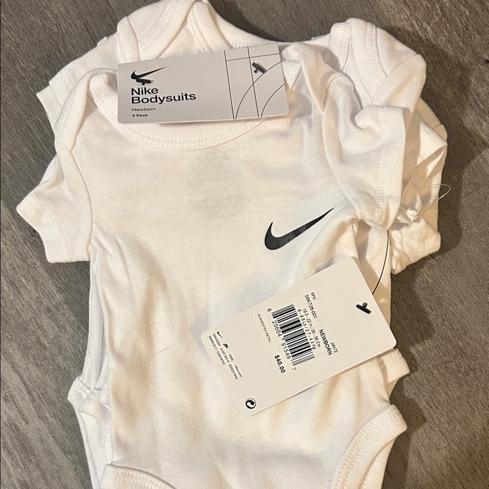 Nike White Infant Bodysuit with Black Logo